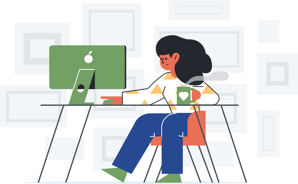 a smiling girl sitting and working on her computer drinking her cup with heart